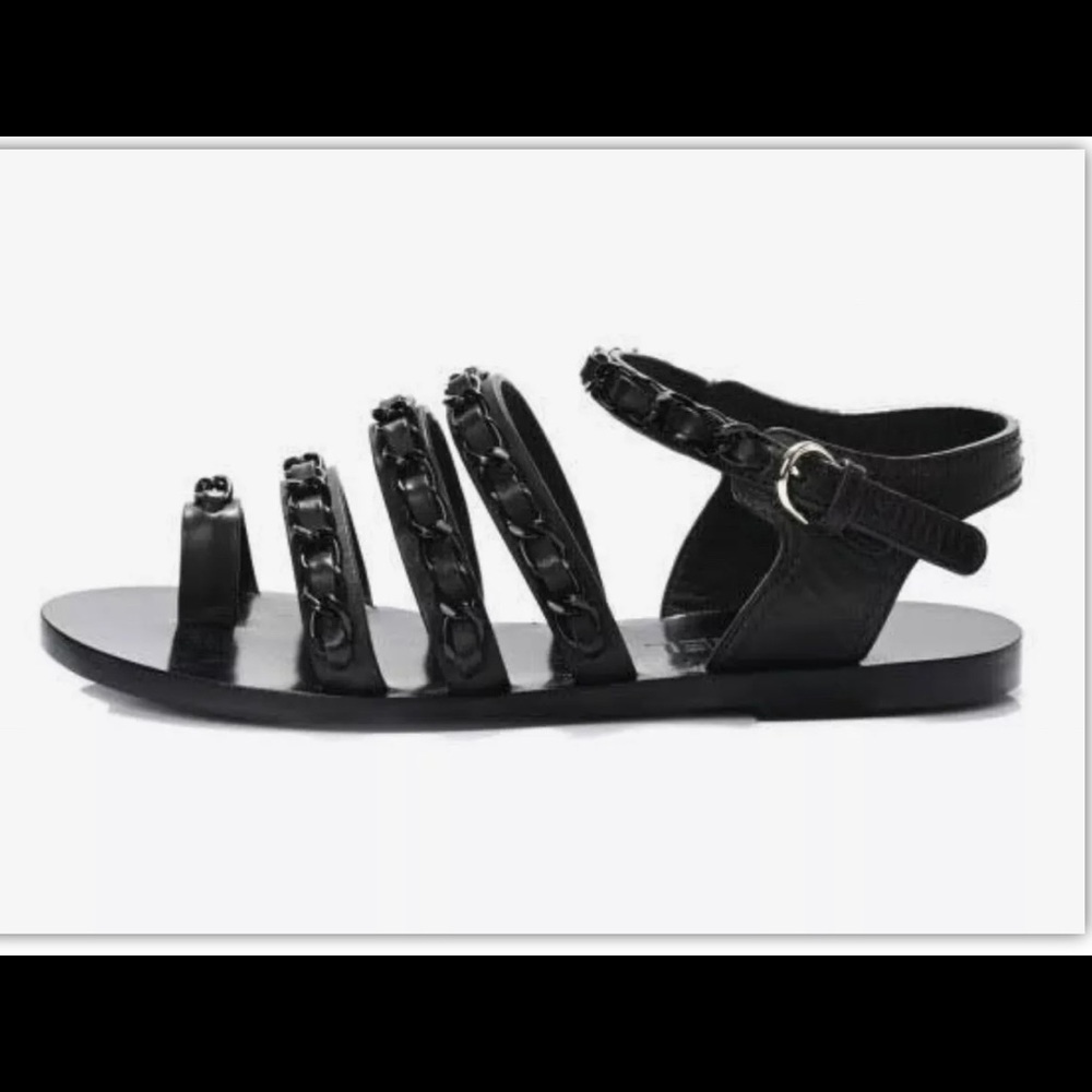 Chanel leather flat cc on the back. Worn twice
